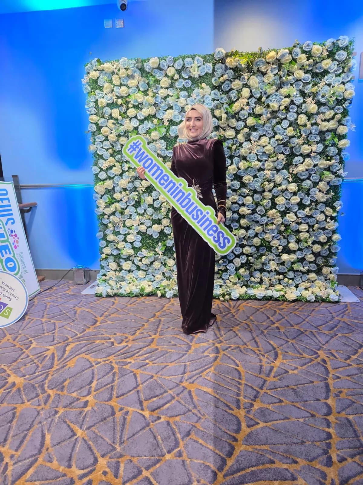 Dr. Elif Torun at the awards evening, wearing a Women in Business sash